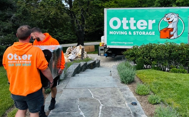 Otter Moving and Storage's crew and truck during a move